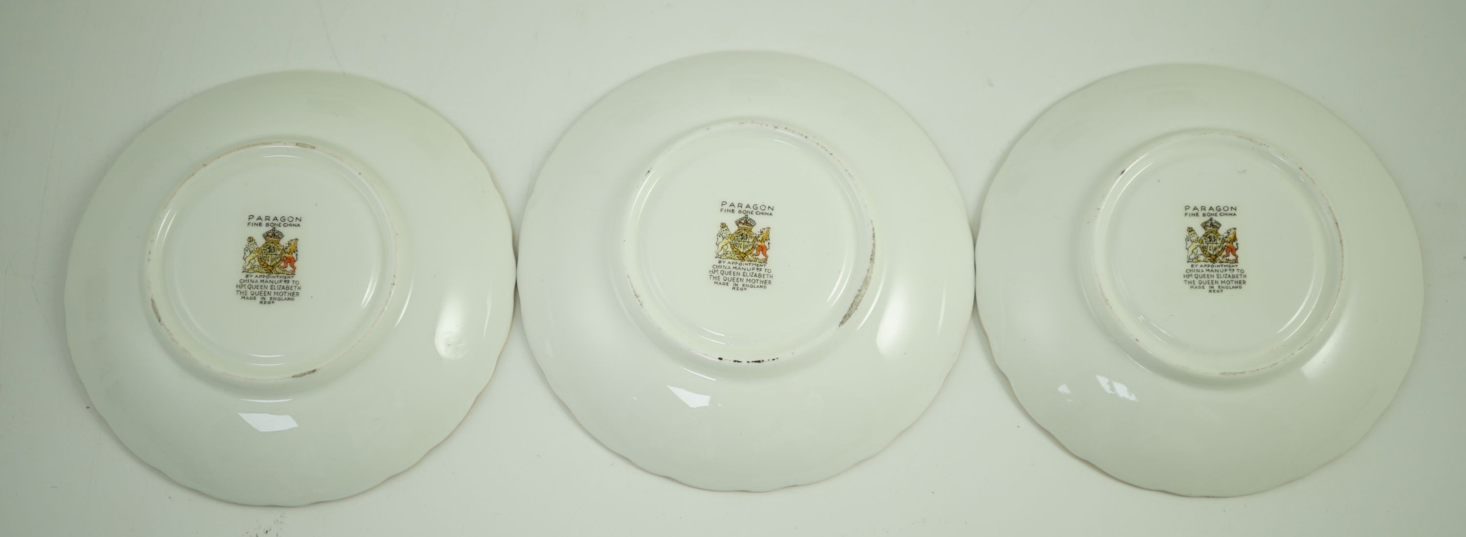 A set of six Paragon bird painted cabinet cups and saucers, 1950s, Saucers 11 cm diameter